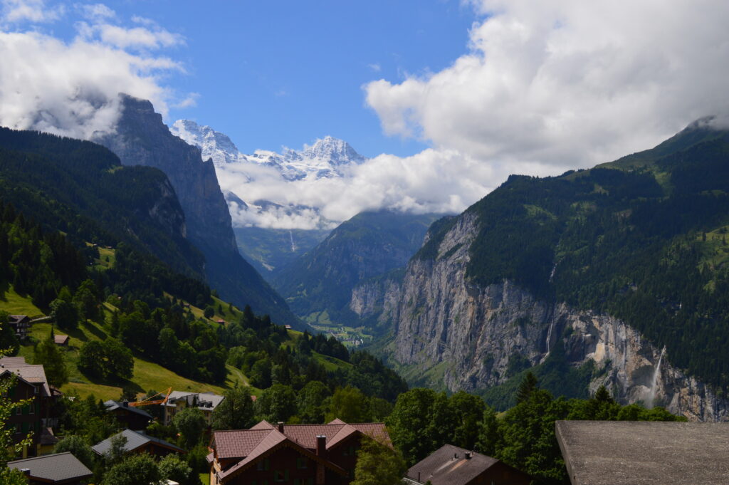 Houses on top of mountains with Lauterbrunnen valley in the background in Switzerland